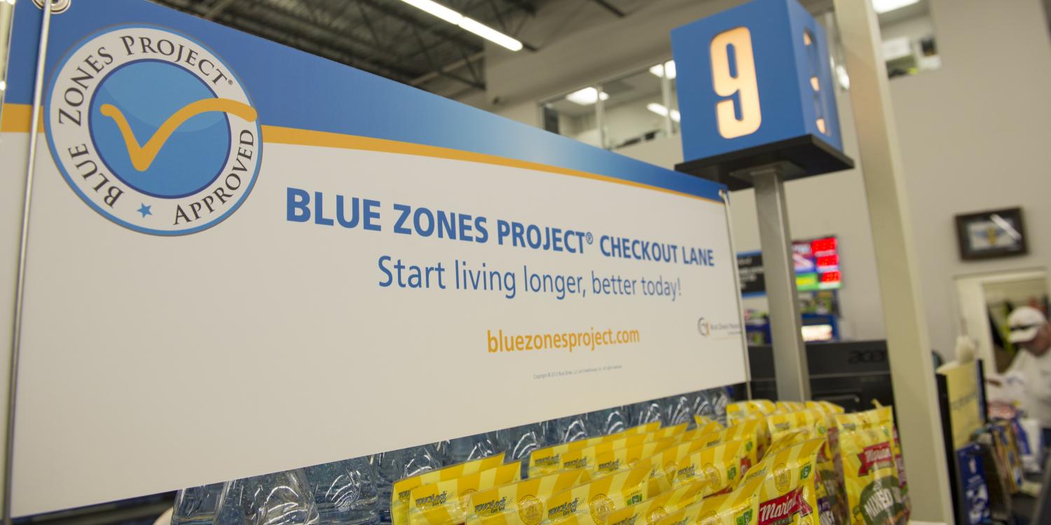 Sherm's Thunderbird grocery store in Klamath Falls features Blue Zones Project signs over healthy choice foods.