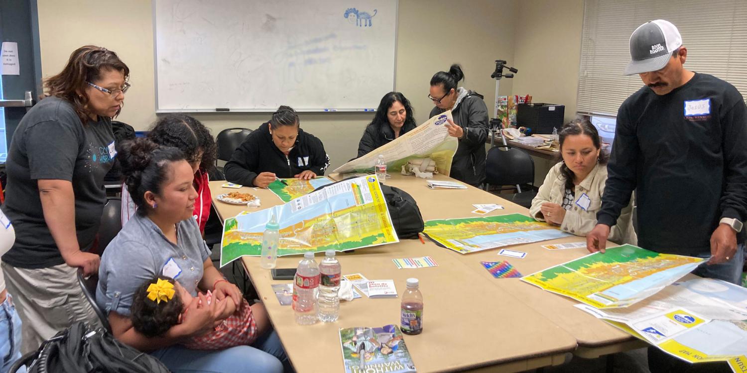 Community members take part in an activity on how to use tsunami evacuation maps during the hazards awareness training at the Bob Chisholm Community Center in Seaside
