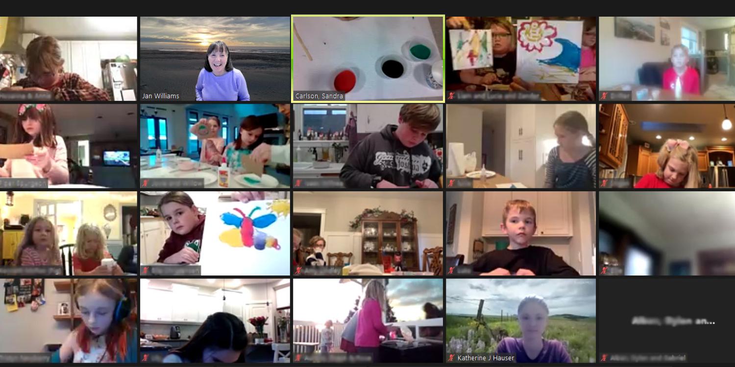A screen shot of kids and adults in a Zoom room.