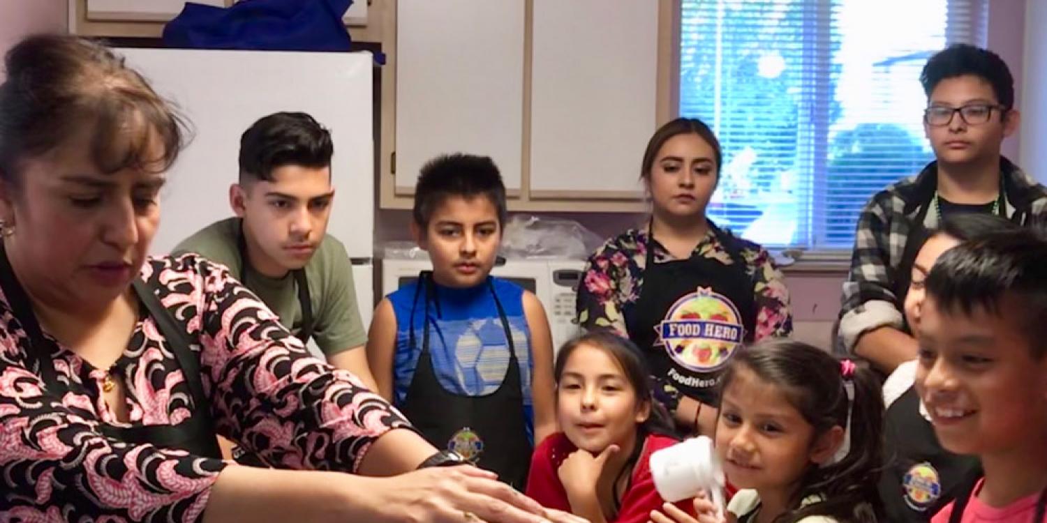 In 2018, Maria Falcon teaches the Healthy Kids Club how to make a delicious and nutritious smoothie.
